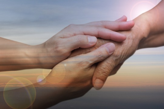 caregiver-carer-hand-holding-elder-hand - VAD 540x360